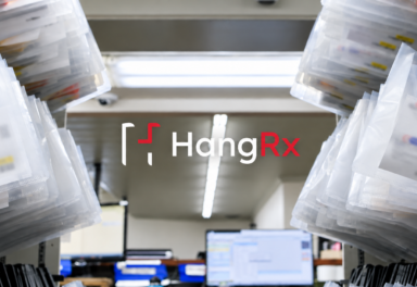 HangRx automated pharmacy will-call system installed on pharmacy racks